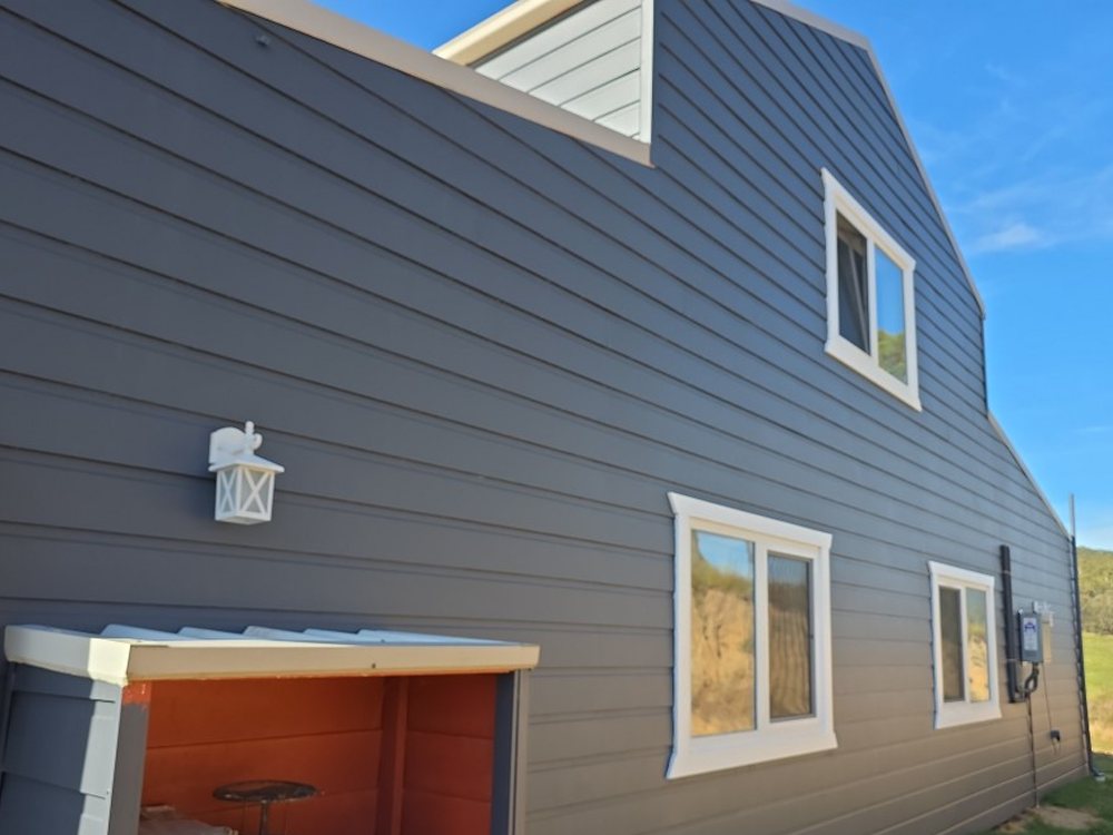 Navy weatherboard with white trim